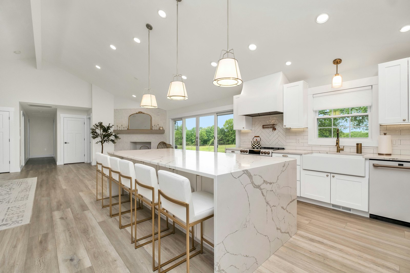 Renovated Palo Alto kitchen with new cabinets, stone counters, and a window over the sink