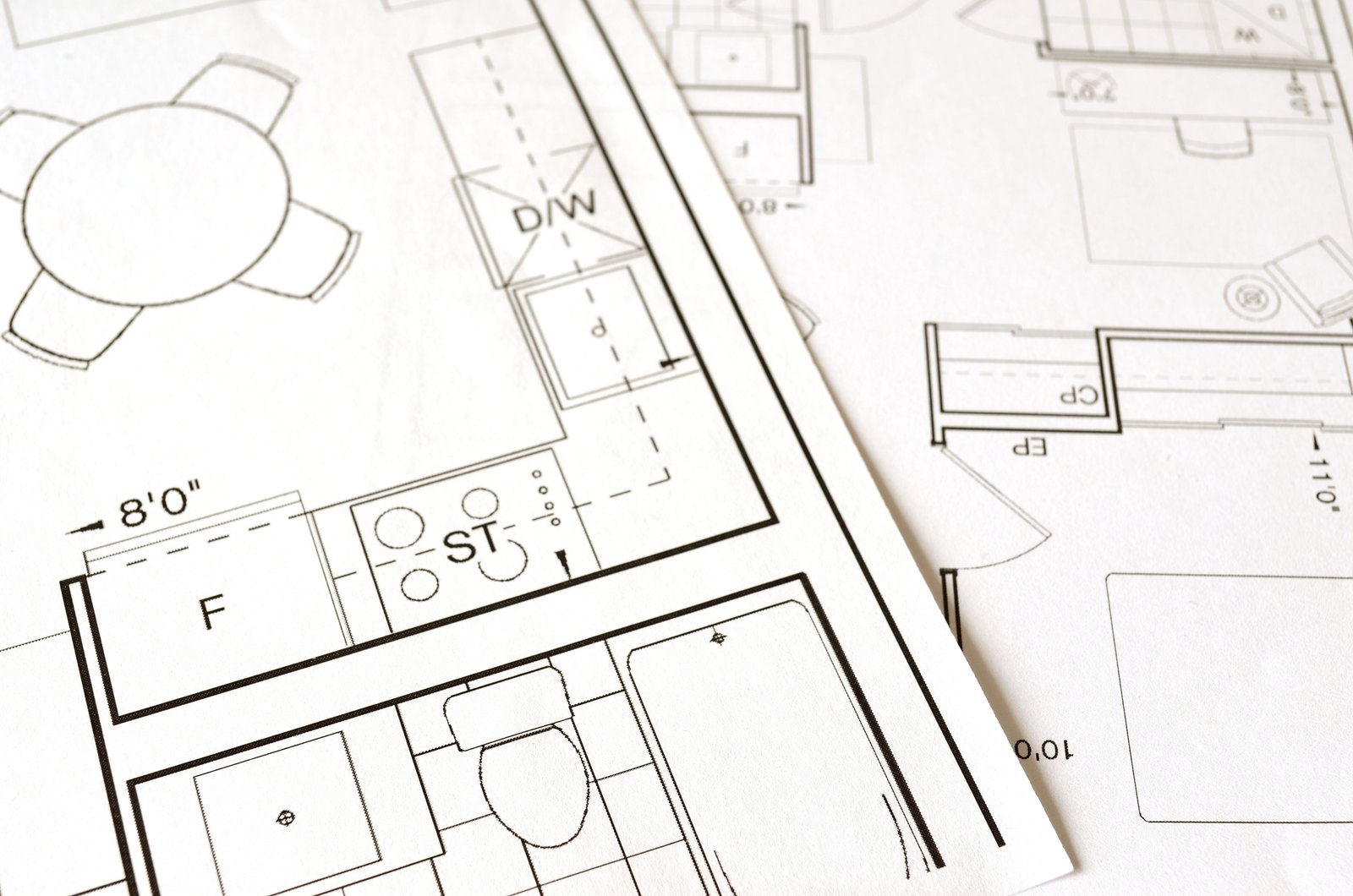 Kitchen floor plan drawings from a permit set, showing appliance placements and room dimensions