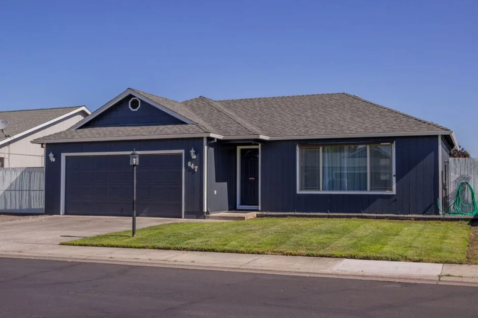 Single-story ranch home of the kind that fills older Bay Area neighborhoods, decades of wear built in